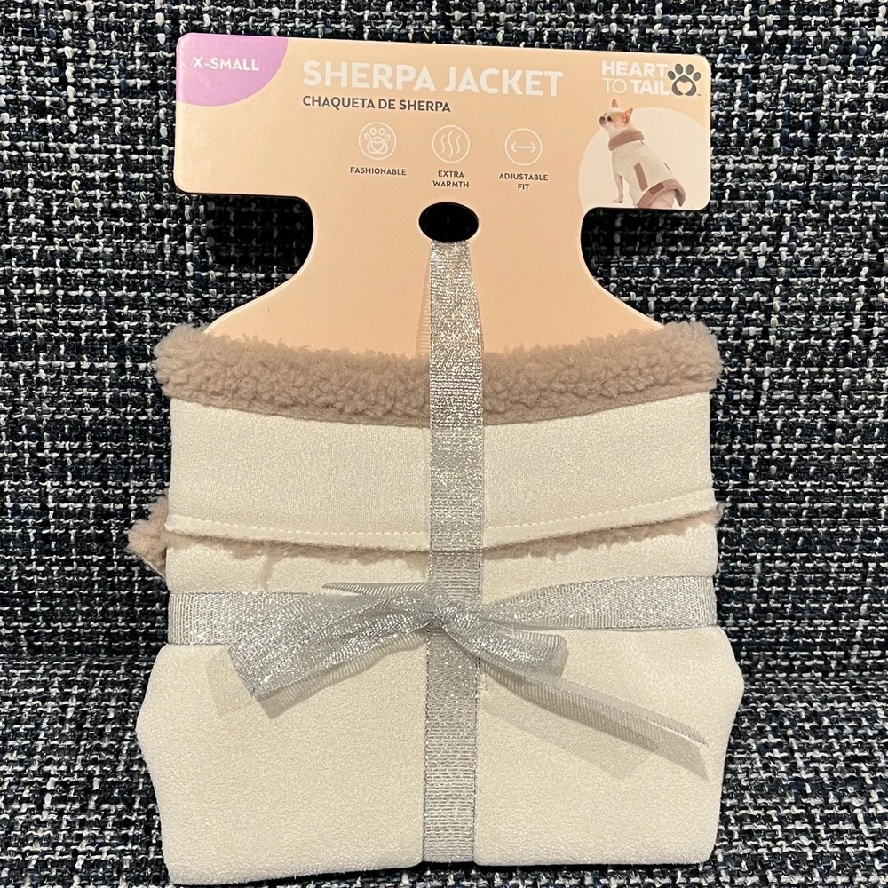 Dog jacket Sherpa lined with buckle neck closure. Cream color tan detailing. XS